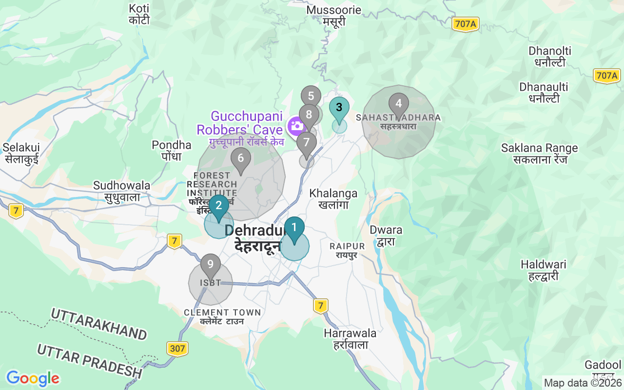 Map of Airbnb guest-review hotspots in Dehradun with location premium circles