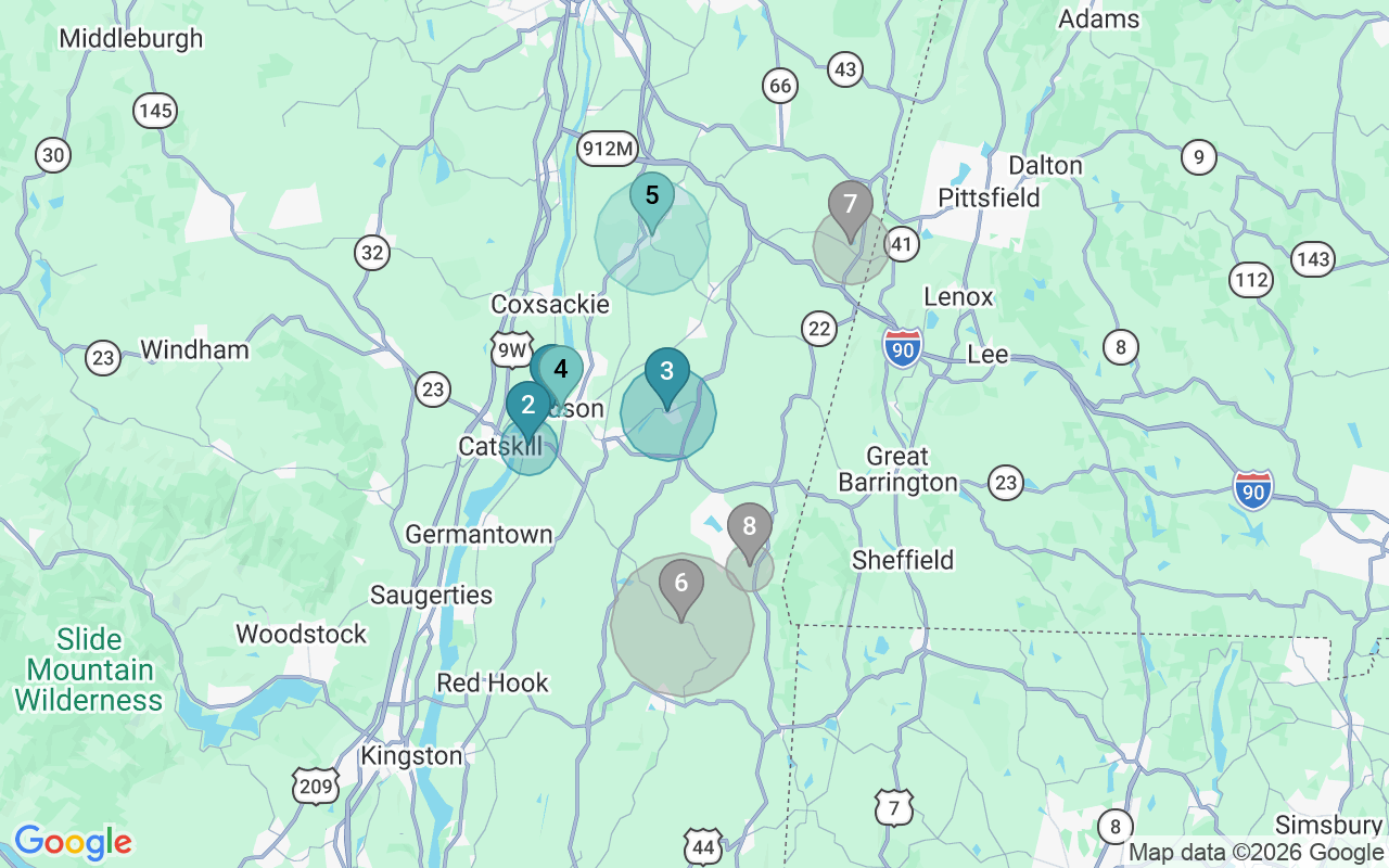 Map of Airbnb guest-review hotspots in Hudson with location premium circles
