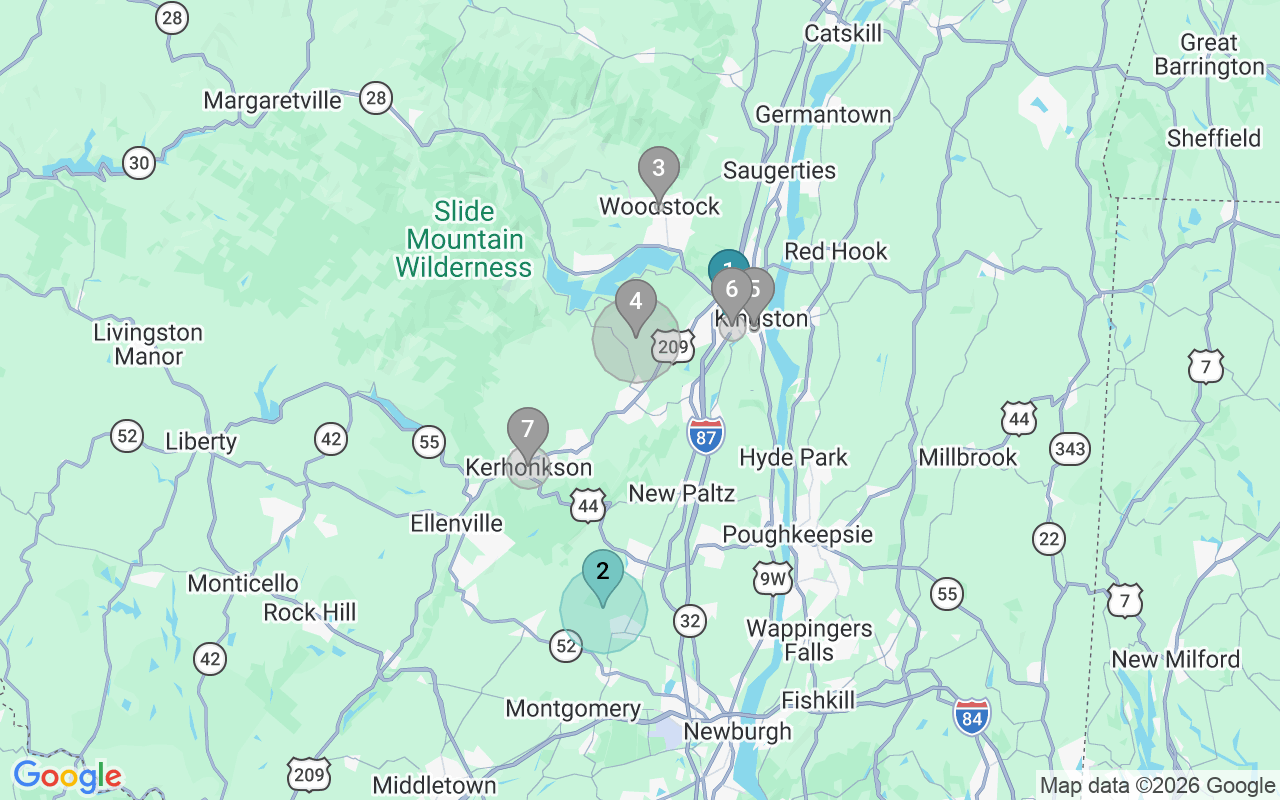 Map of Airbnb guest-review hotspots in Kingston with location premium circles