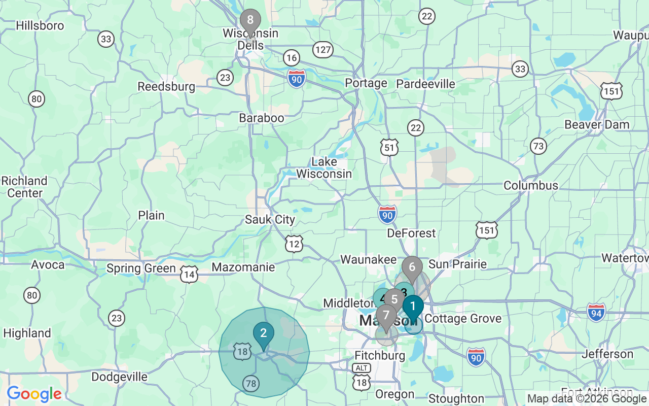 Map of Airbnb guest-review hotspots in Madison with location premium circles