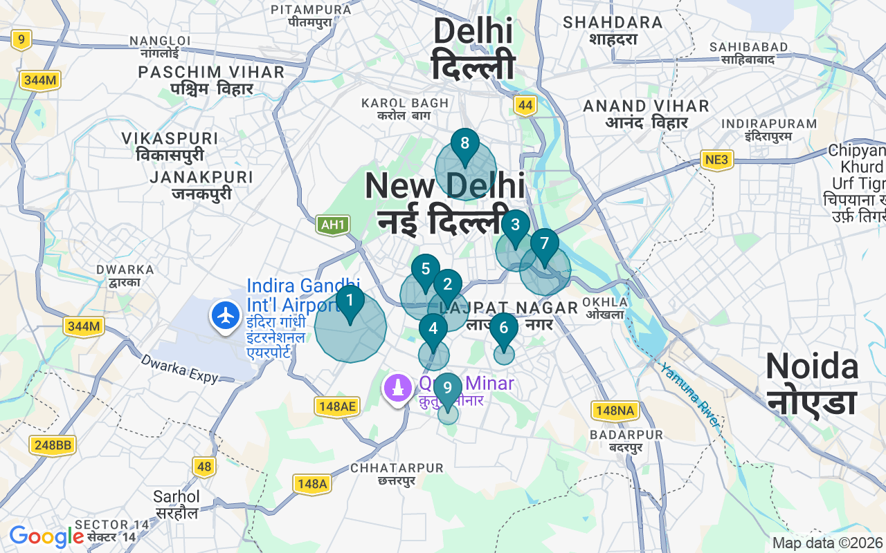 Map of Airbnb guest-review hotspots in New Delhi with location premium circles