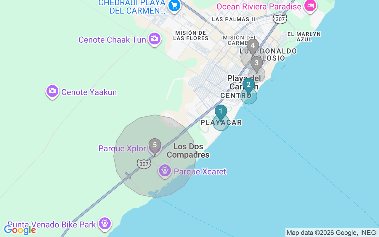 Map of Airbnb guest-review hotspots in Playa del Carmen with location premium circles