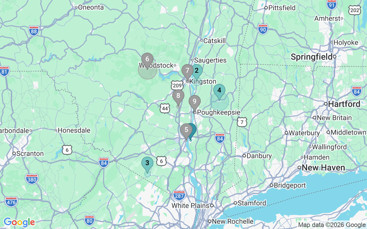 Map of Airbnb guest-review hotspots in Poughkeepsie-Newburgh-Middletown with location premium circles