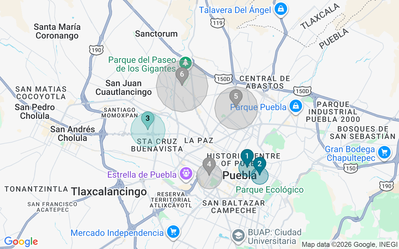 Map of Airbnb guest-review hotspots in Puebla with location premium circles