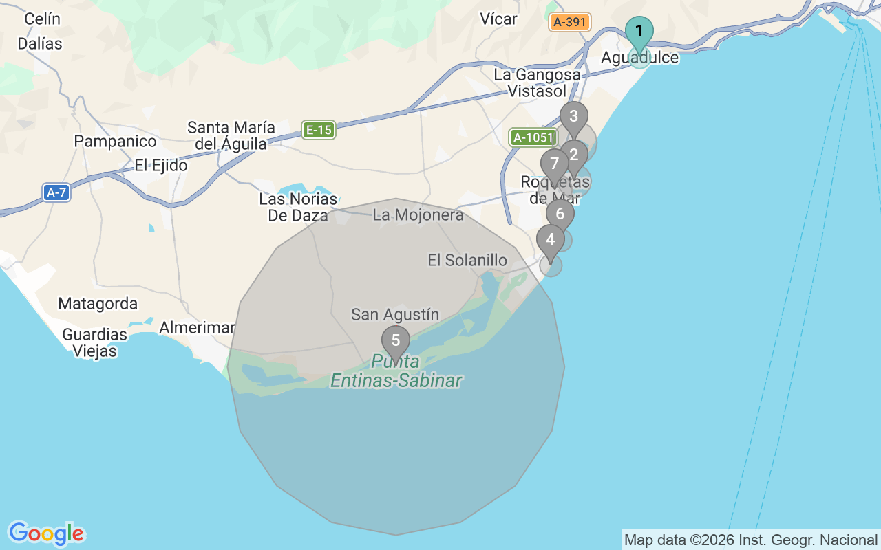 Map of Airbnb guest-review hotspots in Roquetas de Mar with location premium circles