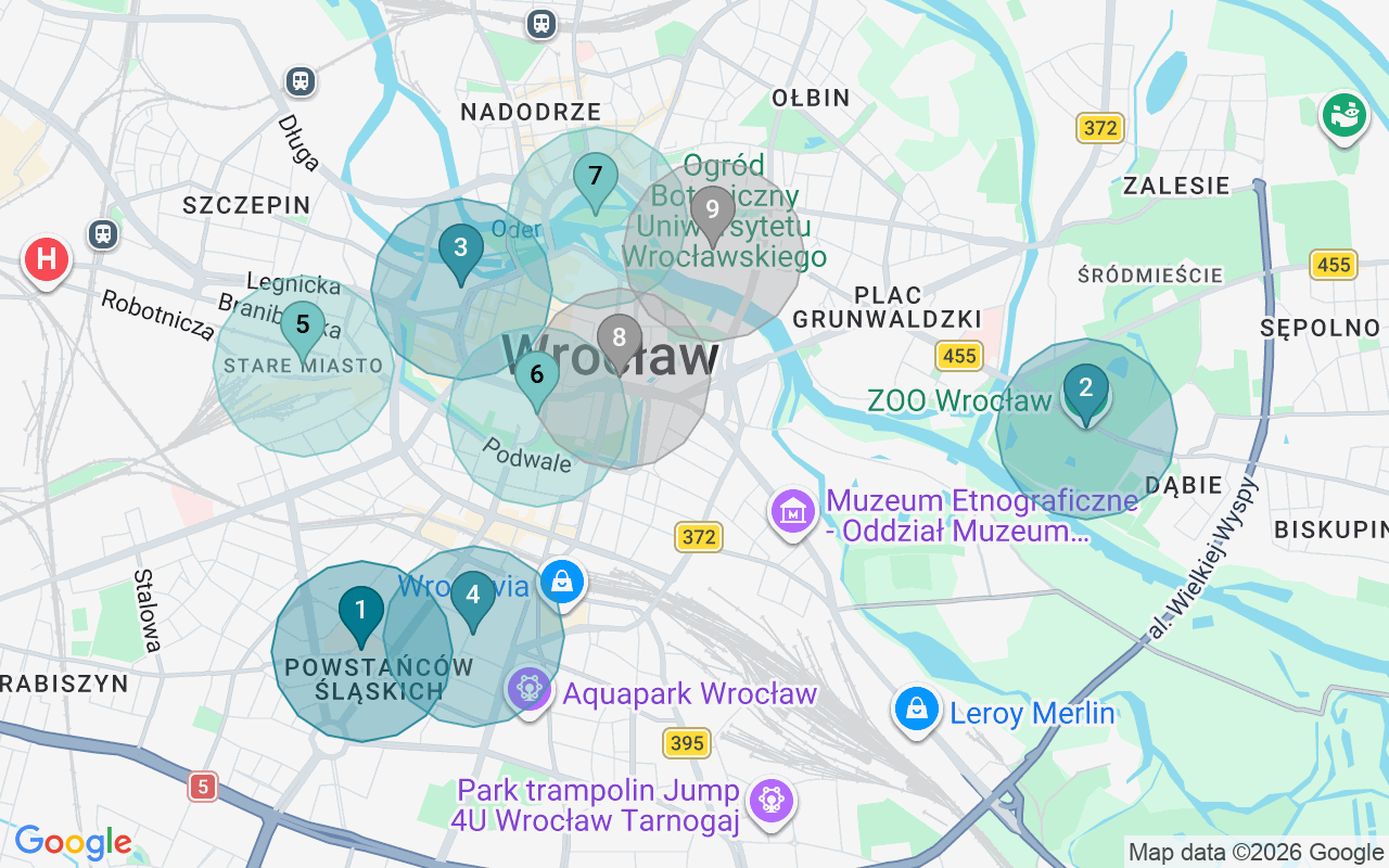 Map of Airbnb guest-review hotspots in Wroclaw with location premium circles